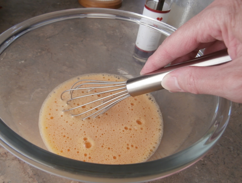 whisking-eggs-for-chocolate-almond-slice-the-recreational-baker